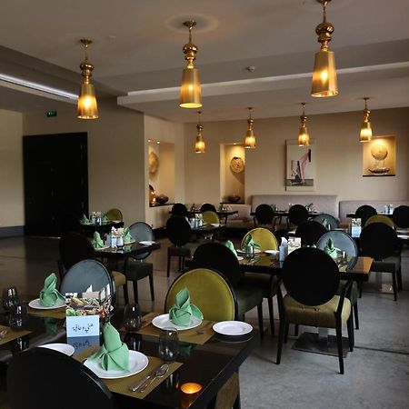 Safir Fintas Hotel Kuwait Koweït Extérieur photo Restaurant in Kigali